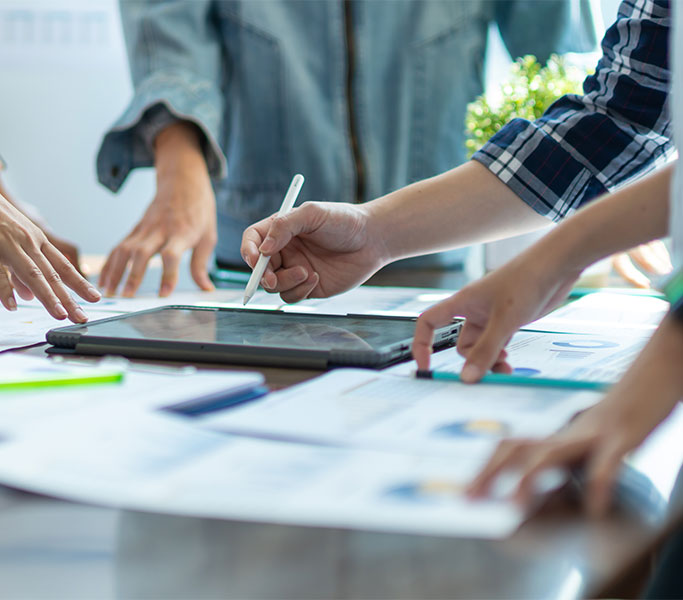 Project Management team going over their plan